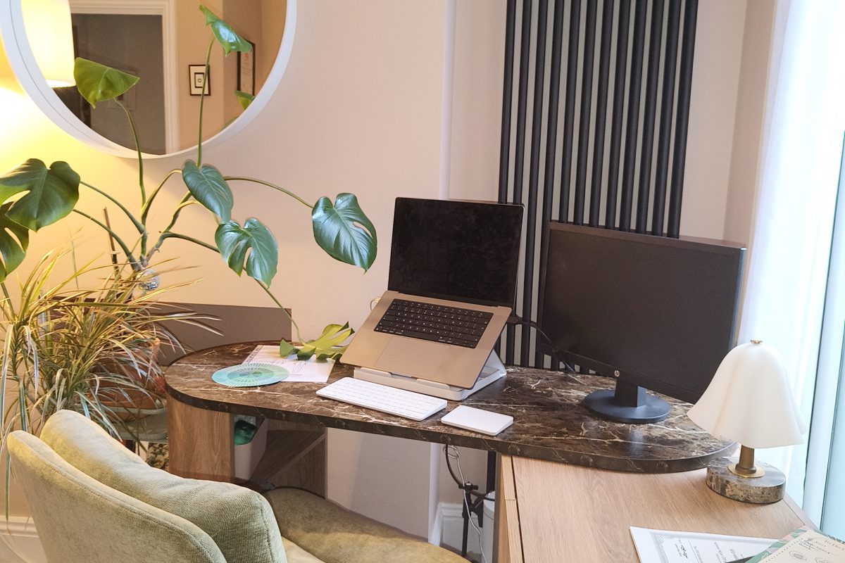 A calm desk set up for online therapy sessions over Google Meet